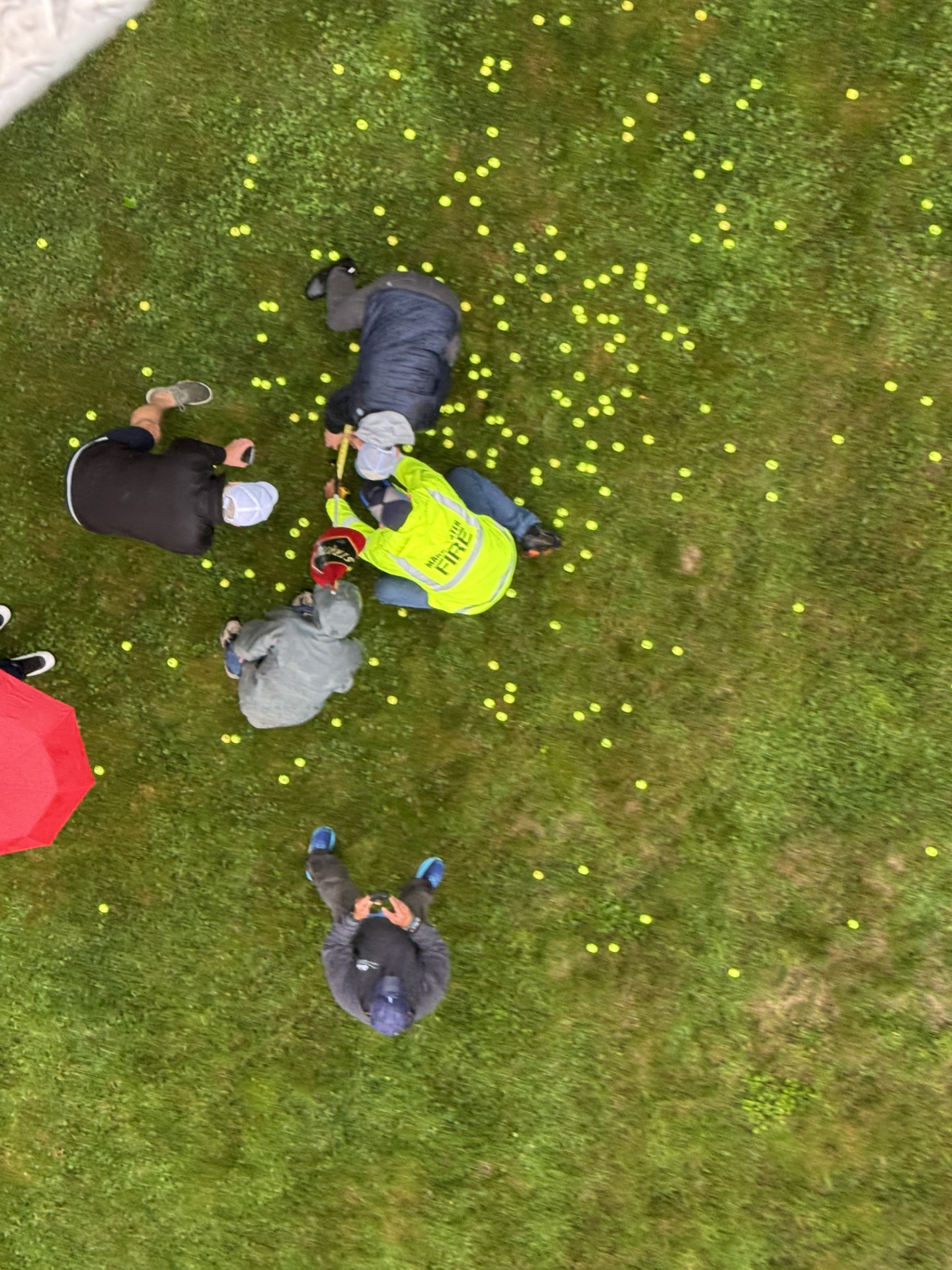 Judges measuring the balls closest to the pin